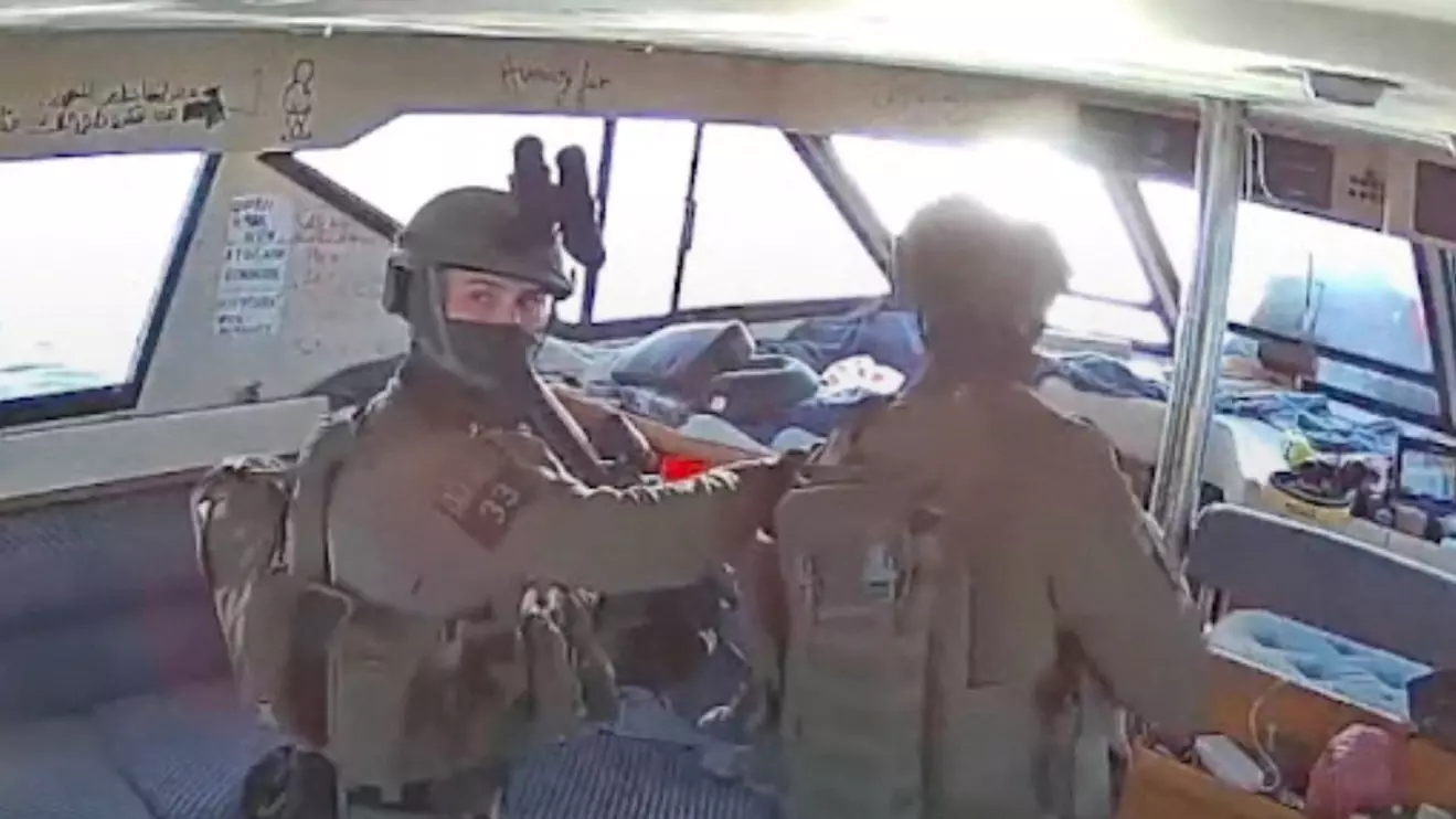 A screengrab from a live stream video shows Israeli navy forces aboard the Gaza-bound vessel Captain Nikos, part of the Global Sumud Flotilla, which flotilla organisers report has been intercepted, October 2, 2025, Reuters