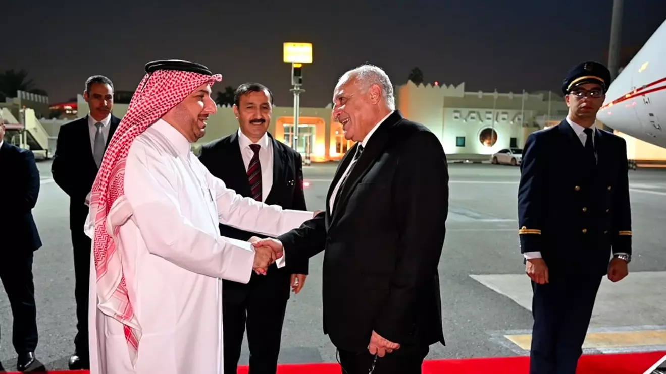 Ahmed Attaf upon arrival at Doha airport