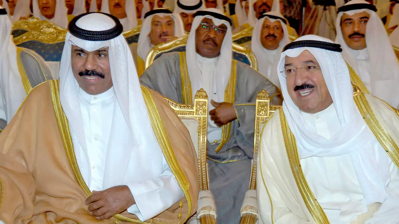 Kuwait's Emir Sheikh Sabah al-Ahmad al-Sabah (R) sits with Kuwait Crown Prince Sheikh Nawaf al-Ahmad al-Sabah during a Foreign Ministry function in Kuwait City, Kuwait April 10, 2006. Reuters/Stephanie McGehee/File Photo