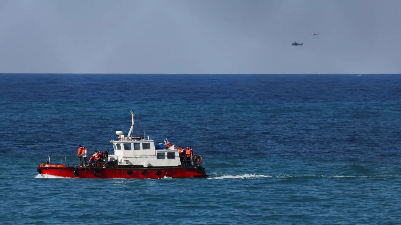 Rescue vessels evacuate people from a passenger boat that capsized off the coast of Kyrenia, in the Turkish-controlled northern Cyprus, August 30, 2026. Reuters/Yiannis Kourtoglou