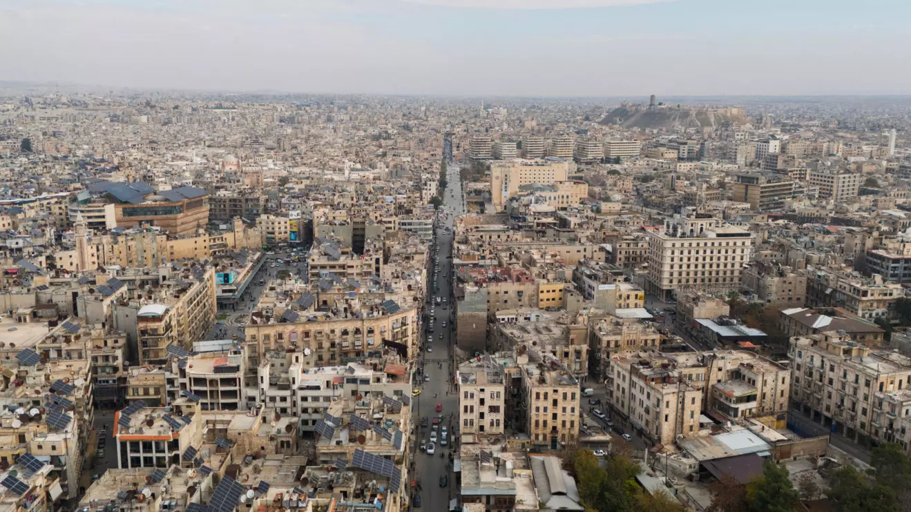A drone view shows buildings and the ancient citadel, in Aleppo, Syria, December 4, 2024. Reuters/Karam al-Masri