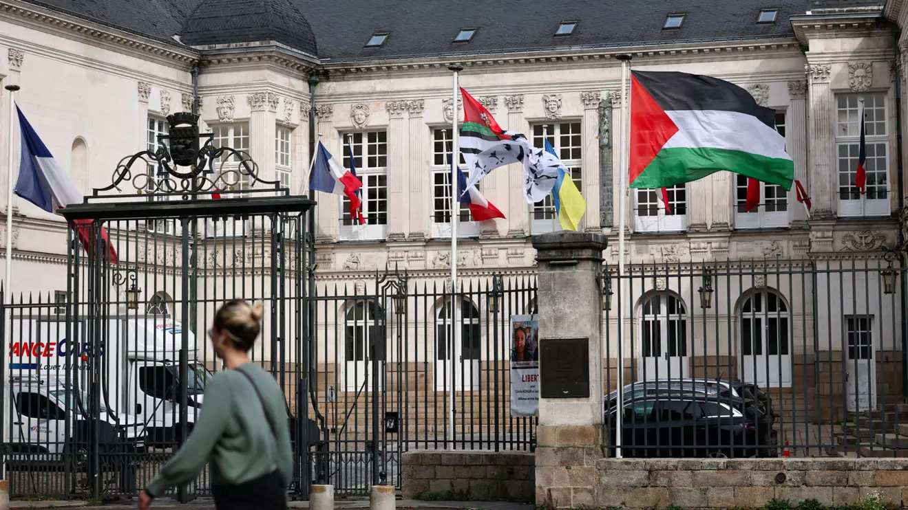 The Palestinian flag flies in front of the city hall in Nantes, France, Reuters/Stephane Mahe