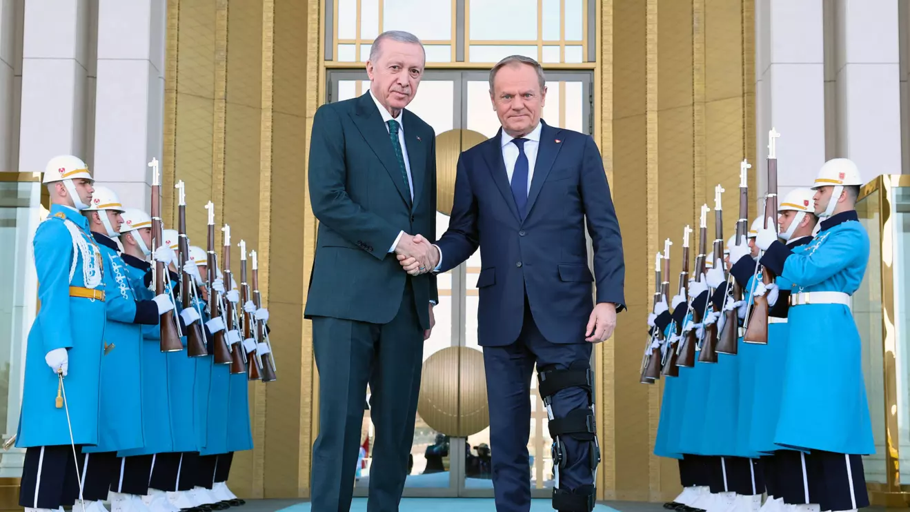 Turkey's President Tayyip Erdogan welcomes Poland's Prime Minister Donald Tusk at the Presidential Palace in Ankara, Turkey, March 12, 2025. Murat Cetinmuhurdar/Turkish Presidential Press Office