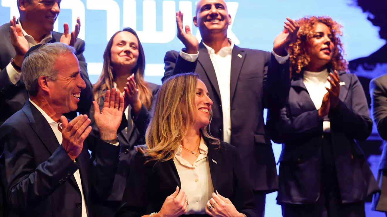 Shira Shapiro, a member of Yashar, attends an event to present the candidate list for the political party, led by Israeli opposition leader and former military chief Gadi Eisenkot, in Rosh Haayin, Israel, September 7, 2026. Shira's son, Aner Shapiro, was killed saving the lives of some partygoers at the Nova festival on October 7, 2023 by throwing grenades back at Hamas militants while he and others sheltered from the attack in a bomb shelter. Reuters/Amir Cohen