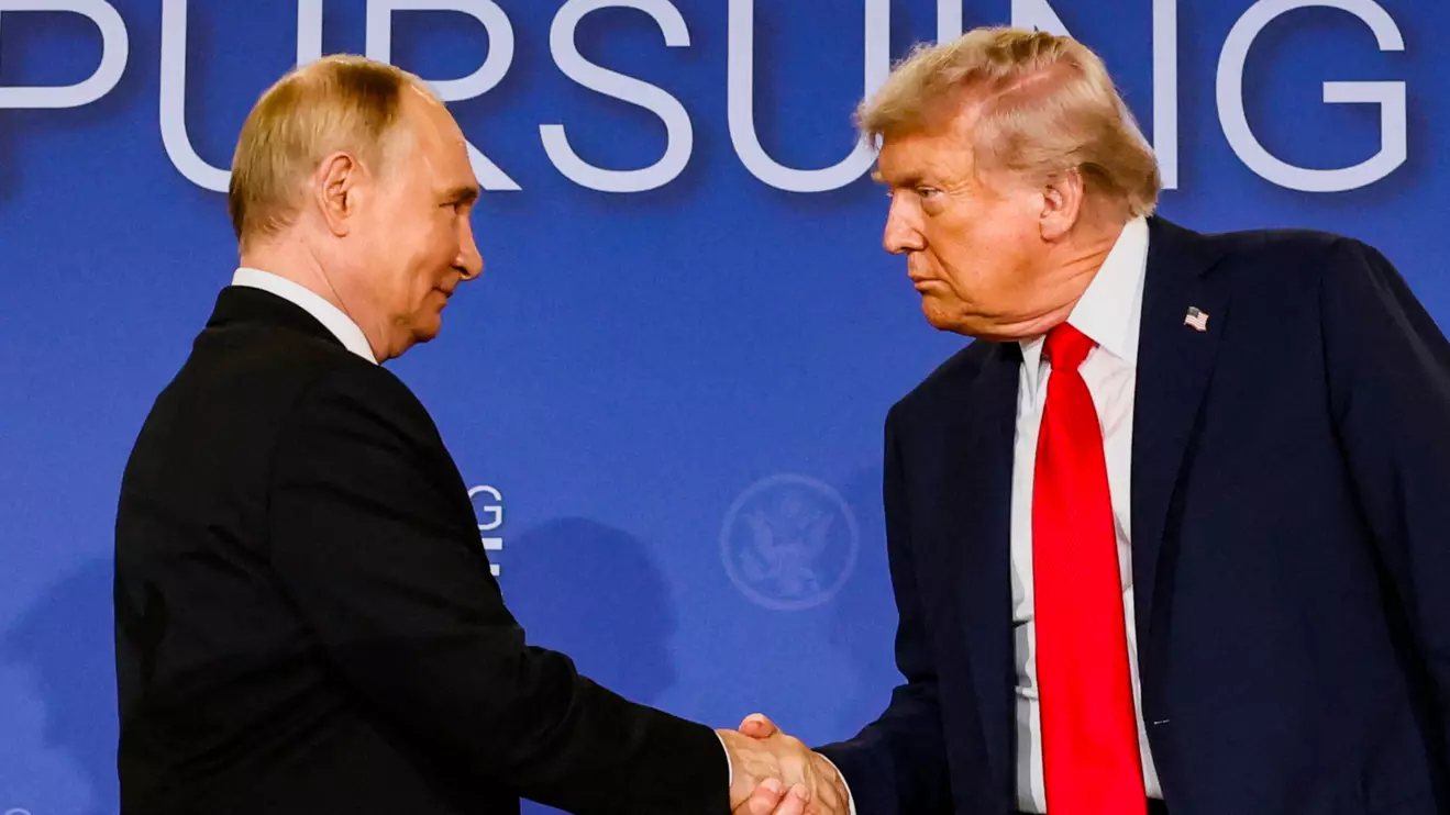 U.S. President Donald Trump and Russian President Vladimir Putin shake hands during a press conference following their meeting to negotiate an end to the war in Ukraine, at Joint Base Elmendorf-Richardson, in Anchorage, Alaska, U.S., August 15, 2025. Reuters/Kevin Lamarque