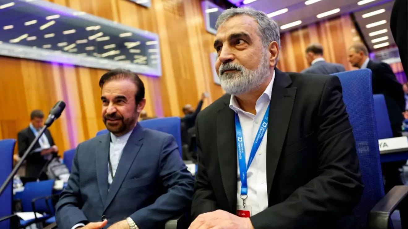 Behrouz Kamalvandi, the spokesman for the Atomic Energy Organization of Iran and Iran's ambassador to the International Atomic Energy Agency (IAEA) Reza Najafi arrive to the opening of the IAEA General Conference at the agency's headquarters in Vienna, Austria, September 14, 2026. Reuters/Lisa Leutner