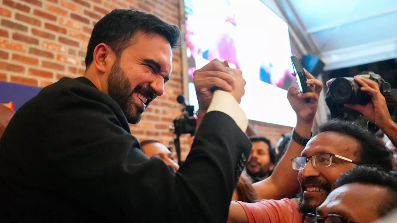 Zohran Mamdani greets a supporter during a watch party for his primary election, which includes his bid to become the Democratic candidate for New York City mayor in the upcoming November 2025 election, in New York City, U.S., June 25, 2025. Reuters/David 'Dee' Delgado