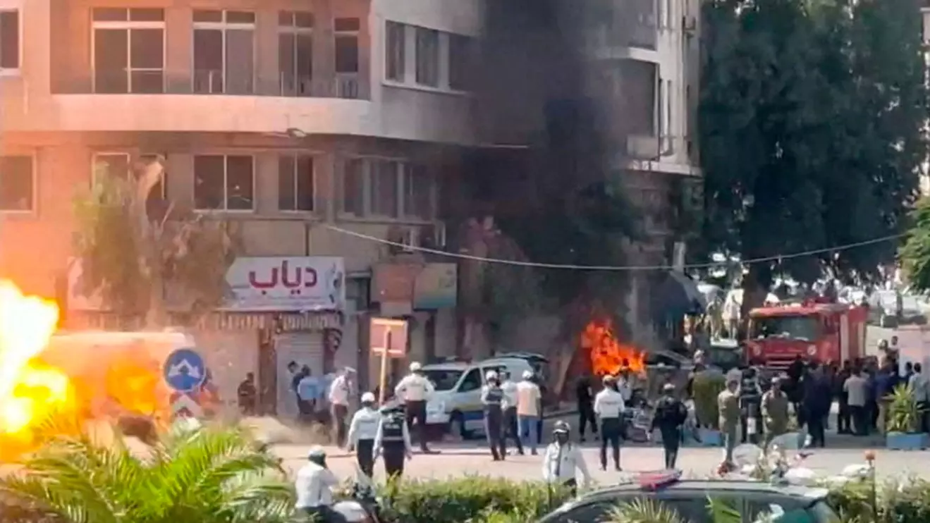 Smoke and fire rise at the site where explosive devices blew up near a hotel where French President Emmanuel Macron was meant to be staying, in Damascus, Syria, in this screengrab obtained from a video, July 7, 2026. Reuters/Yamam Al Shaar