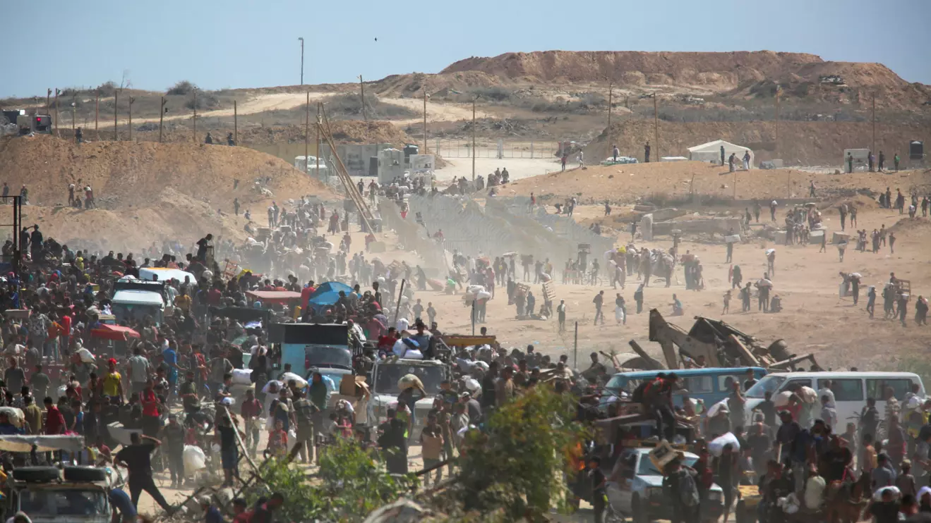 Palestinians seek aid supplies from the U.S.-backed Gaza Humanitarian Foundation (GHF), in the central Gaza Strip, August 4, 2025. Reuters