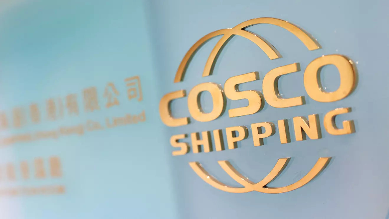 The logo of COSCO Shipping is displayed at its office in Hong Kong, Reuters/Tyrone Siu
