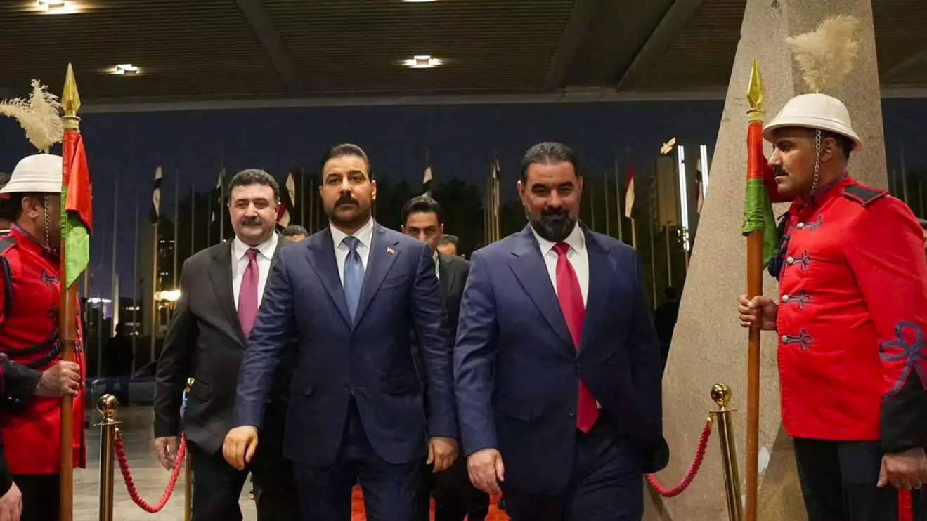 Speaker of Iraq's Parliament Haibat al-Halbousi welcomes Prime Minister Ali al-Zaidi at the parliament building ahead of a session to approve the remaining members of his cabinet, in Baghdad, Iraq, October 15, 2026. Iraqi Prime Minister's Media Office