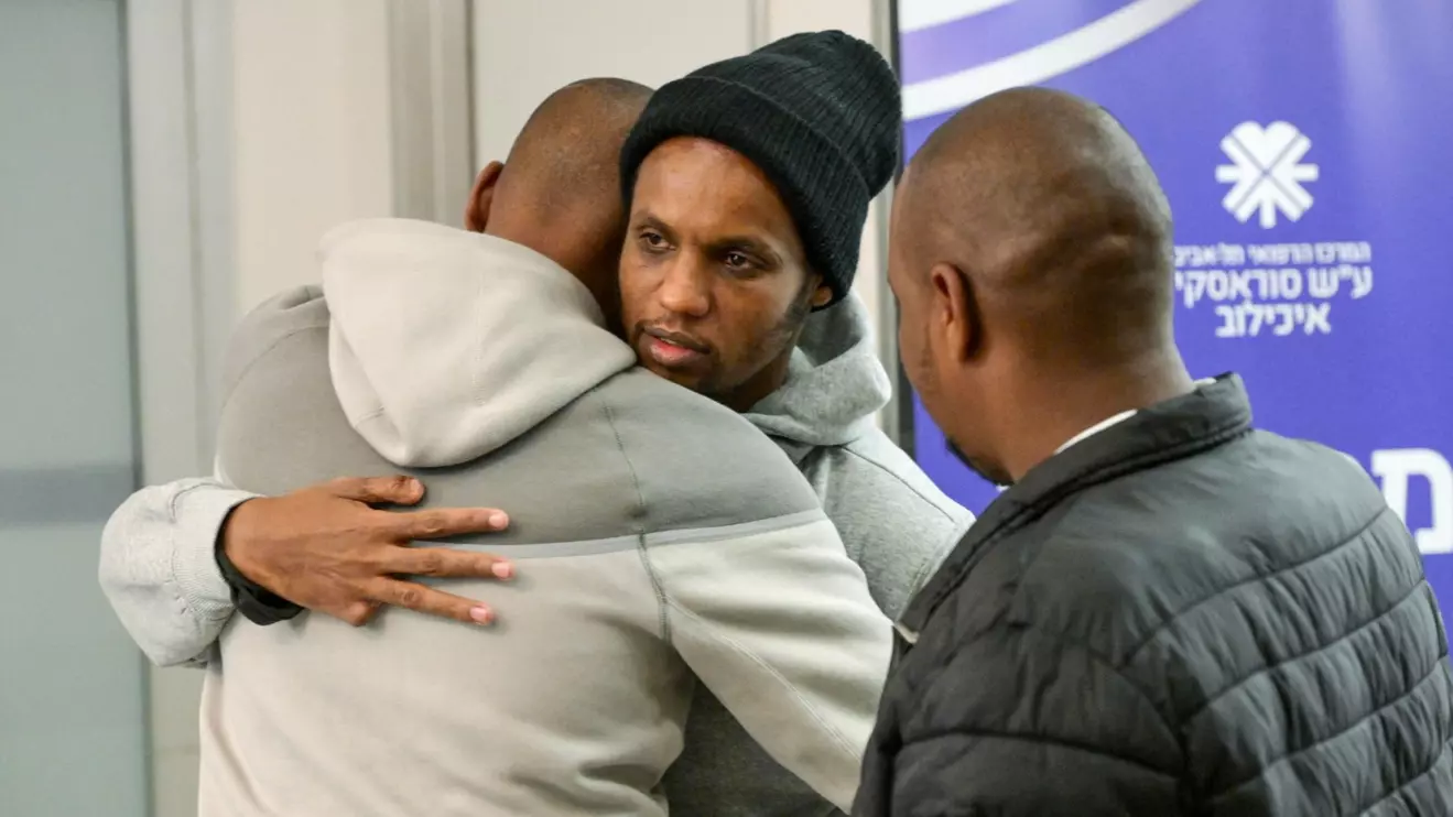Avera Mengistu, who entered Gaza around a decade ago and was held there since, reacts during the reunion with his family, after he was released as part of hostages-prisoners swap and a ceasefire deal between Hamas and Israel, at Ichilov Hospital, in Tel Aviv, Israel February 22, 2025. Maayan Toaf/GPO