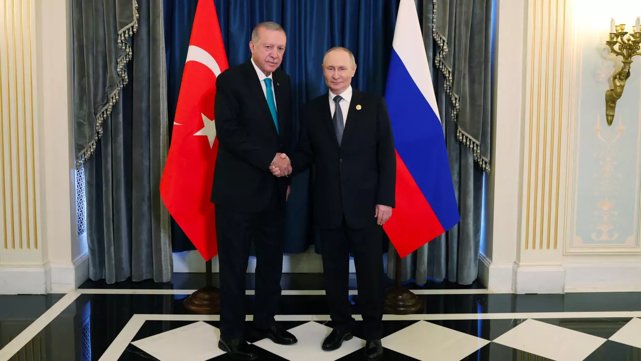 Turkish President Tayyip Erdogan shakes hands with Russia's President Vladimir Putin during a meeting on the sidelines of Shanghai Cooperation Organisation (SCO) Summit in Tianjin, China, September 1, 2025. Murat Cetinmuhurdar/Turkish Presidential Press Office