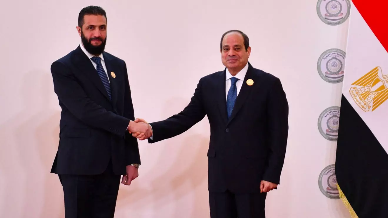 Egyptian President Abdel Fattah el-Sisi, greets Syria's interim President Ahmed al-Sharaa as Egypt hosts emergency Arab summit to discuss Palestinian developments, at Egypt's New Administrative Capital in Cairo, March 4, 2025. Egyptian Presidency