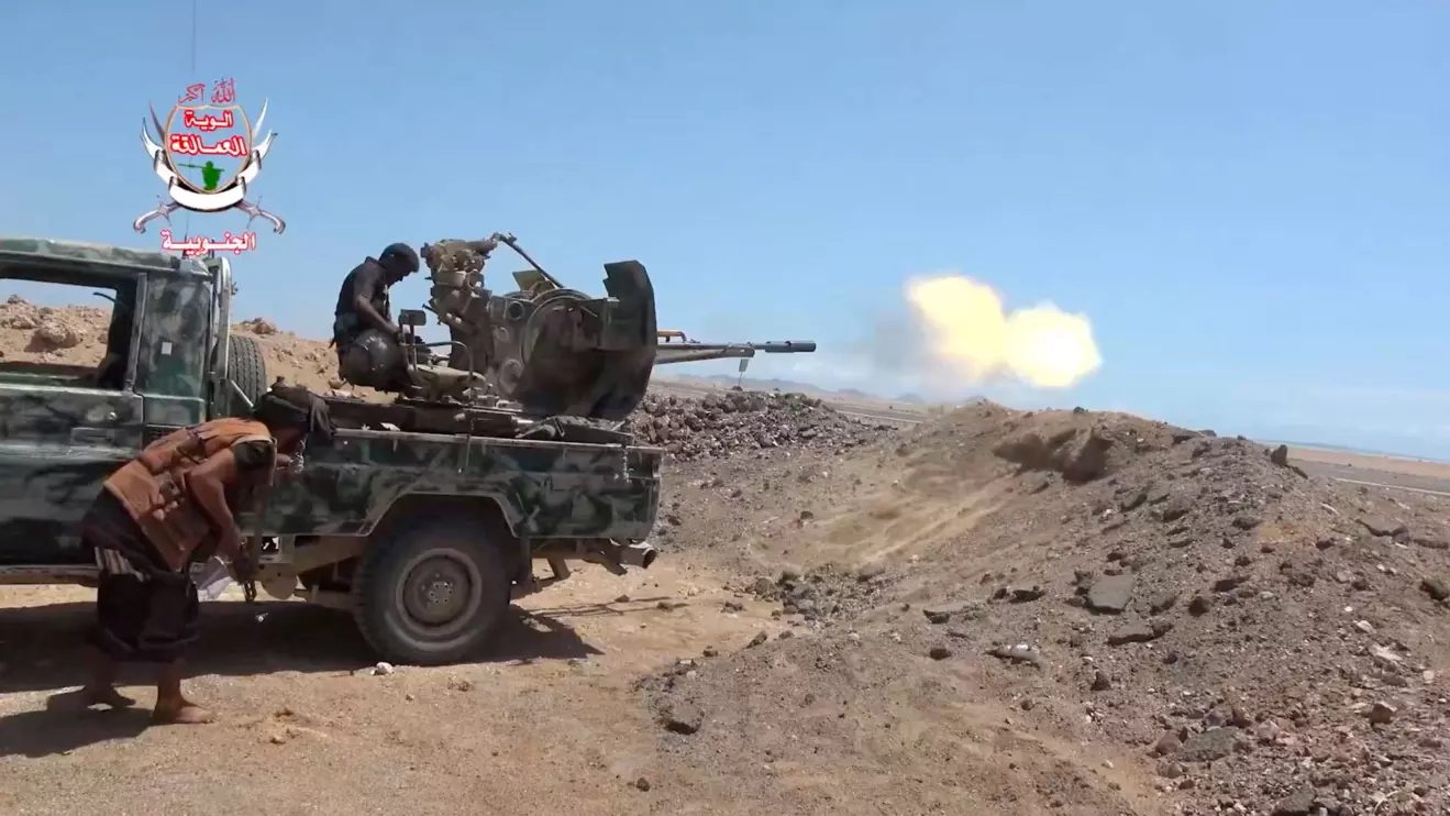 A pro-Saudi-backed Yemeni government fighter fires a vehicle-mounted weapon during what government forces say was an advance against the Iran-backed Houthis, near Dhubab, Taiz Governorate, Yemen, in this still image taken from video released October 5, 2026. Southern Giants Brigades