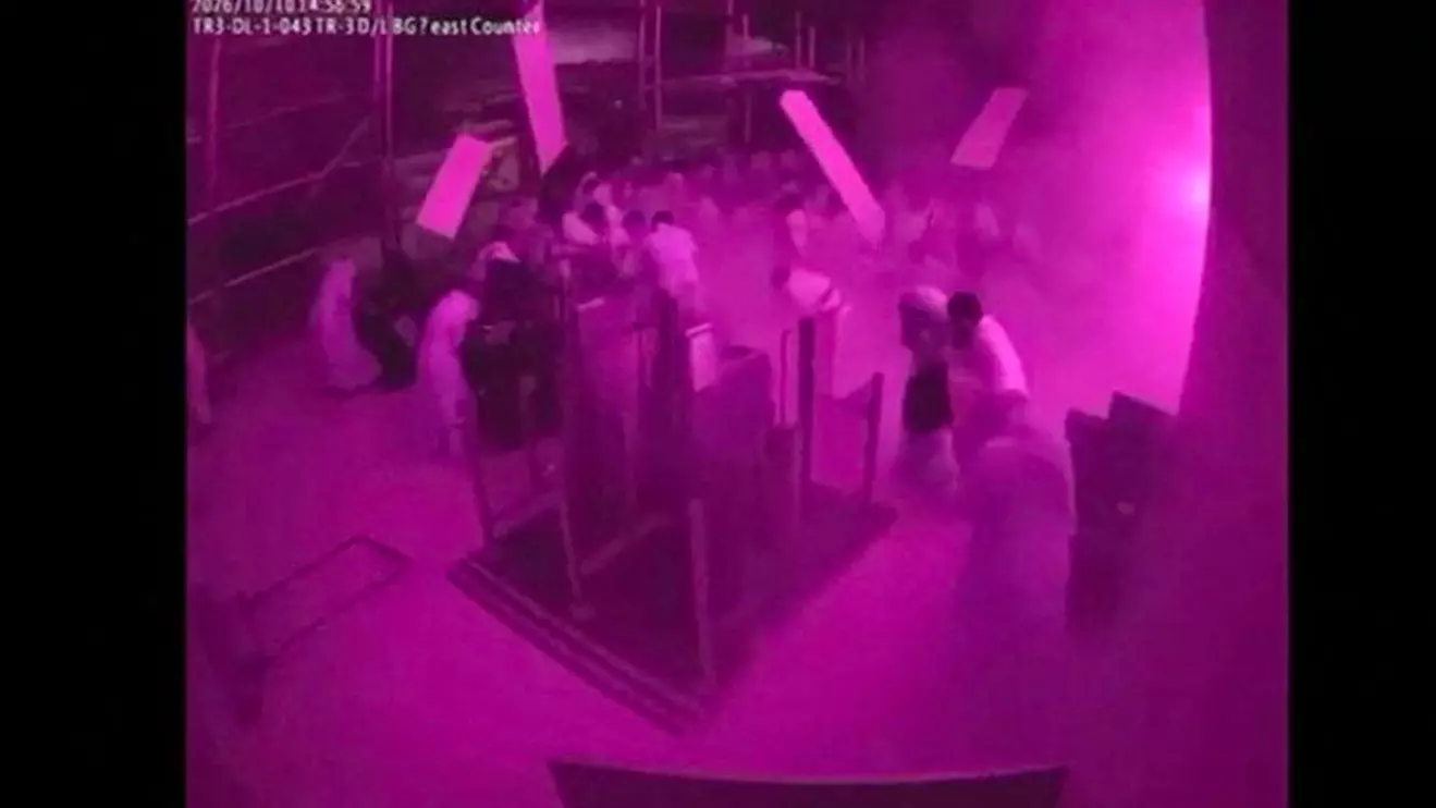 Surveillance footage shows debris falling as people react at the moment of an attack at King Khalid International Airport in Riyadh, Saudi Arabia, October 10, 2026, in this frame from a handout video. Saudi Ministry of Media/Handout via Reuters