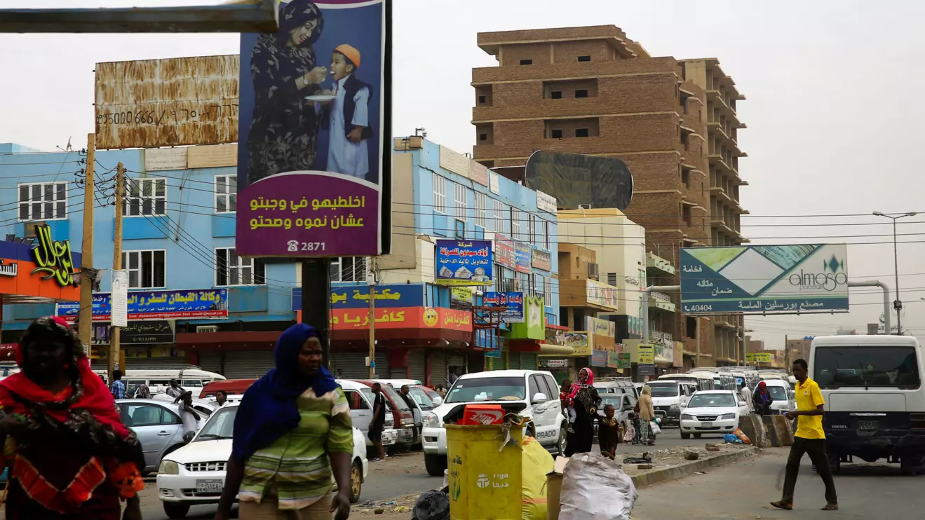 A general view shows Sudanese people and traffic along a street in Khartoum, Sudan June 11, 2019. Reuters/Mohamed Nureldin Abdallah