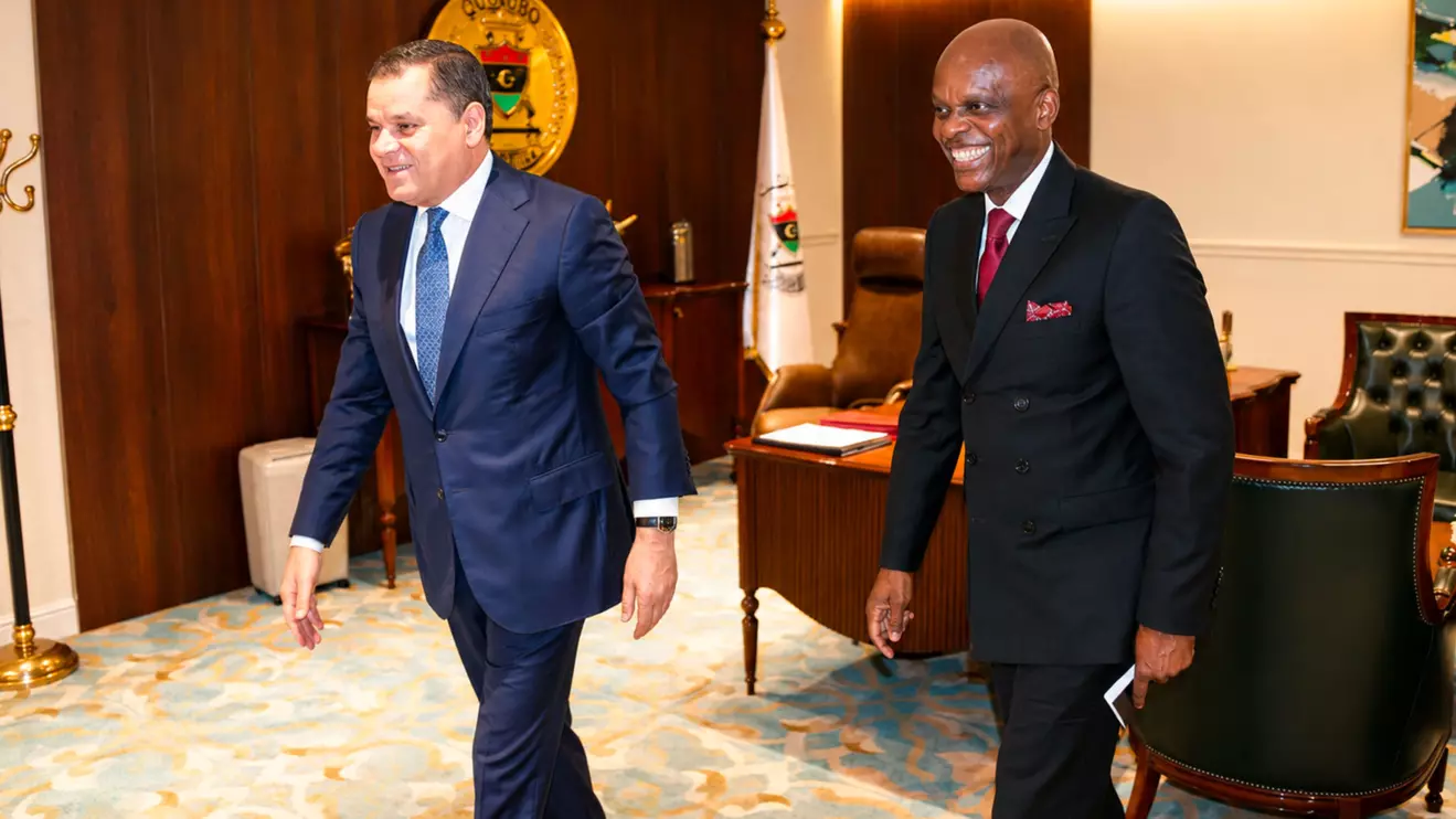 Abdul Hamid Dbeibah welcomes Robert Dussey during talks in Tripoli on Tuesday © LMN