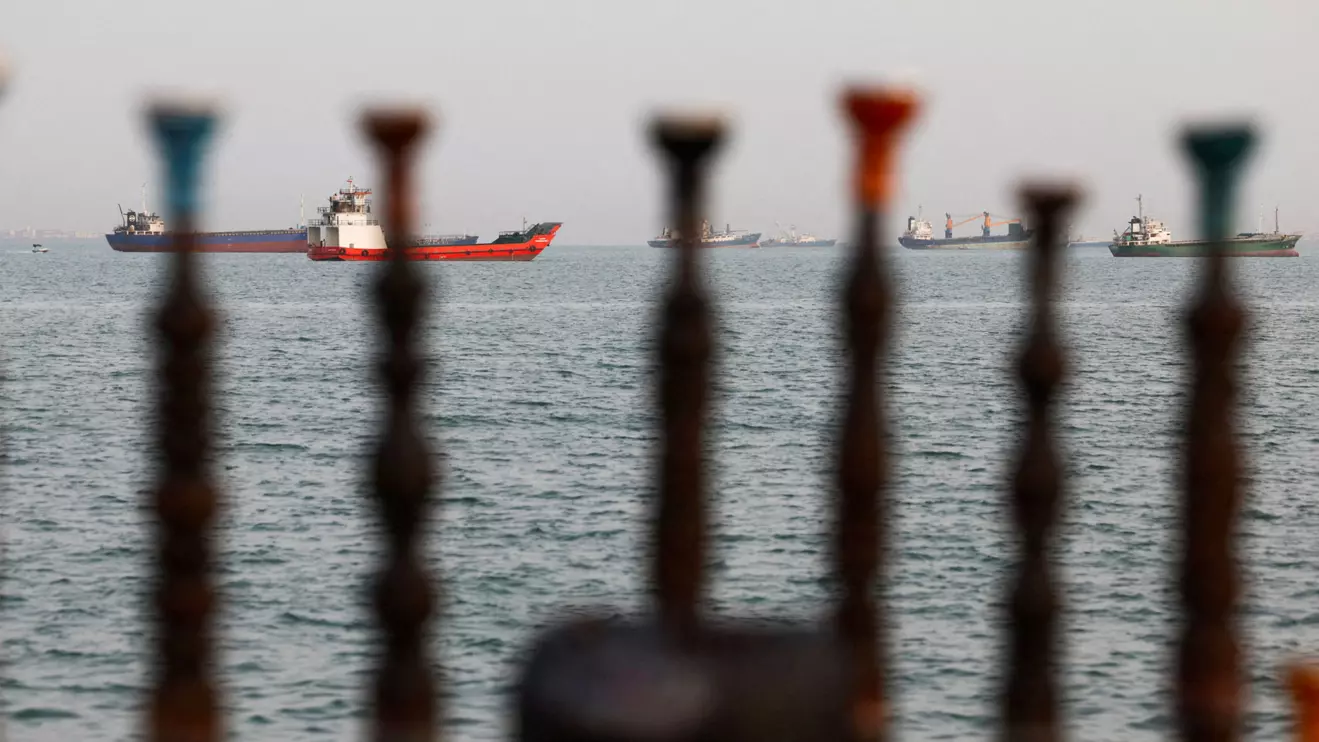 Vessels in the Strait of Hormuz are visible near the beach of Bandar Abbas, Iran, May 22, 2026. Majid Asgaripour/WANA (West Asia News Agency) via Reuters