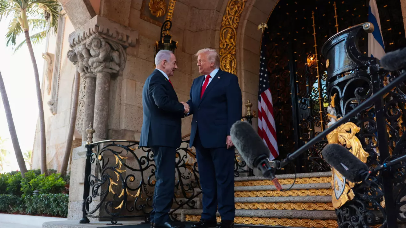 U.S. President Donald Trump greets Israeli Prime Minister Benjamin Netanyahu upon arrival for meetings at Trump's Mar-a-Lago club in Palm Beach, Florida, U.S., December 29, 2025. Reuters/Jonathan Ernst