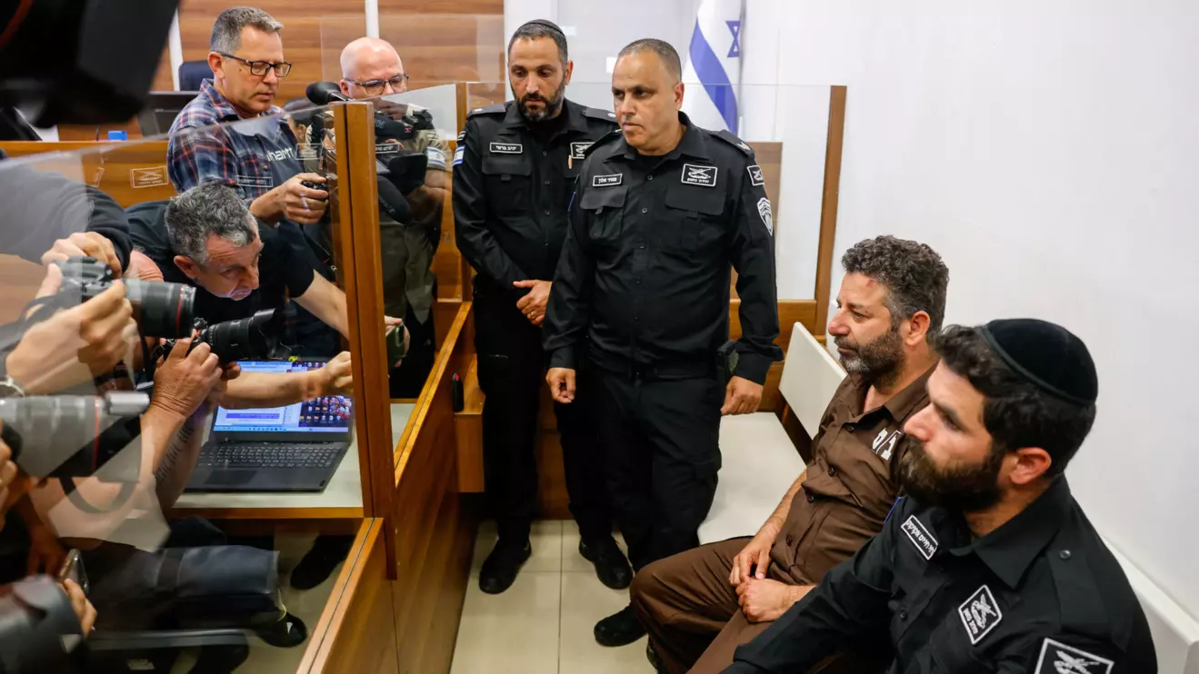 Pro Hamas activist Saif Abu Keshek, a member of the Global Sumud Flotilla detained by Israel, sits at a magistrate's court for a detention extension hearing in Ashkelon, southern Israel, May 3, 2026. Reuters/Amir Cohen