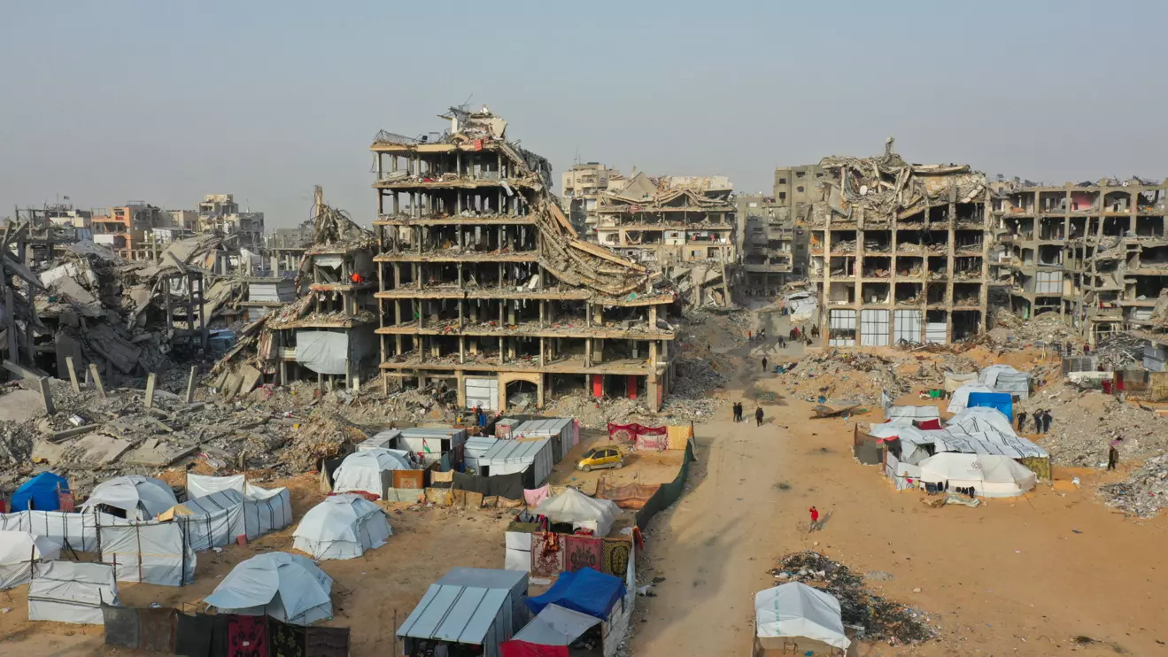 A drone view shows houses destroyed during the Israeli offensive, amid a ceasefire between Israel and Hamas, in Beit Hanoun, northern Gaza Strip, March 5, 2025. Reuters/Mahmoud Al-Basos