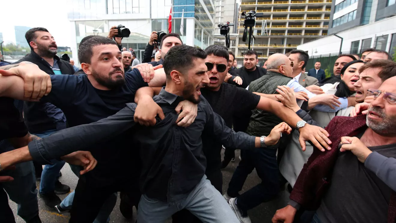 Supporters of Kemal Kilicdaroglu, the former Republican People’s Party (CHP) chairman reinstated by a court decision, scuffle with supporters of ousted party chairman Ozgur Ozel as they try to enter the party’s headquarters in Ankara, Turkey, May 24, 2026. Reuters/Efekan Akyuz