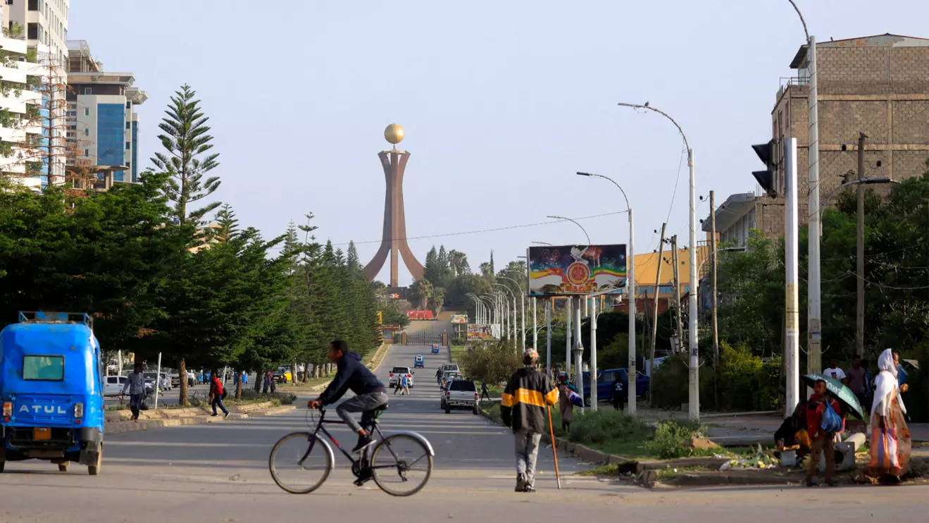 A general view shows motorists, a biker and pedestrians near the Tigray Martyrs monument in Mekele, Tigray Region, Ethiopia, June 22, 2023. Reuters/Tiksa Negeri