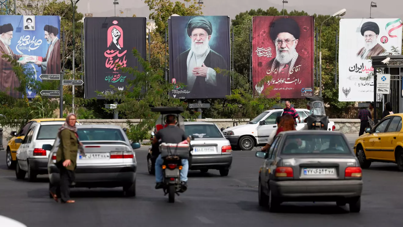 Banners with pictures of the late Supreme Leader of Iran, Ayatollah Ali Khamenei, are displayed on a street in Tehran, Iran, August 22, 2026. Majid Asgaripour/WANA (West Asia News Agency) via Reuters