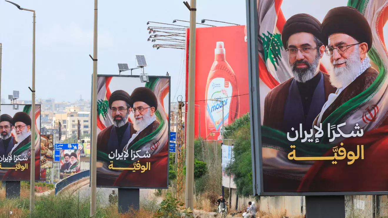 Billboards showing Iran’s new Supreme Leader Ayatollah Mojtaba Khamenei and his late father Ali Khamenei, with the slogan “Thank you to loyal Iran,” stand along the highway leading to Rafic Hariri International Airport in Beirut, Lebanon June 22, 2026.Reuters/Mohamed Azakir