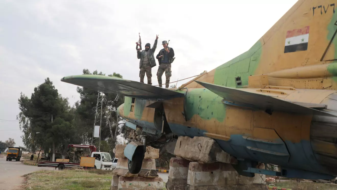 Rebel fighters at Hama's military airport, Syria December 7, 2024. Reuters/Mahmoud Hasano