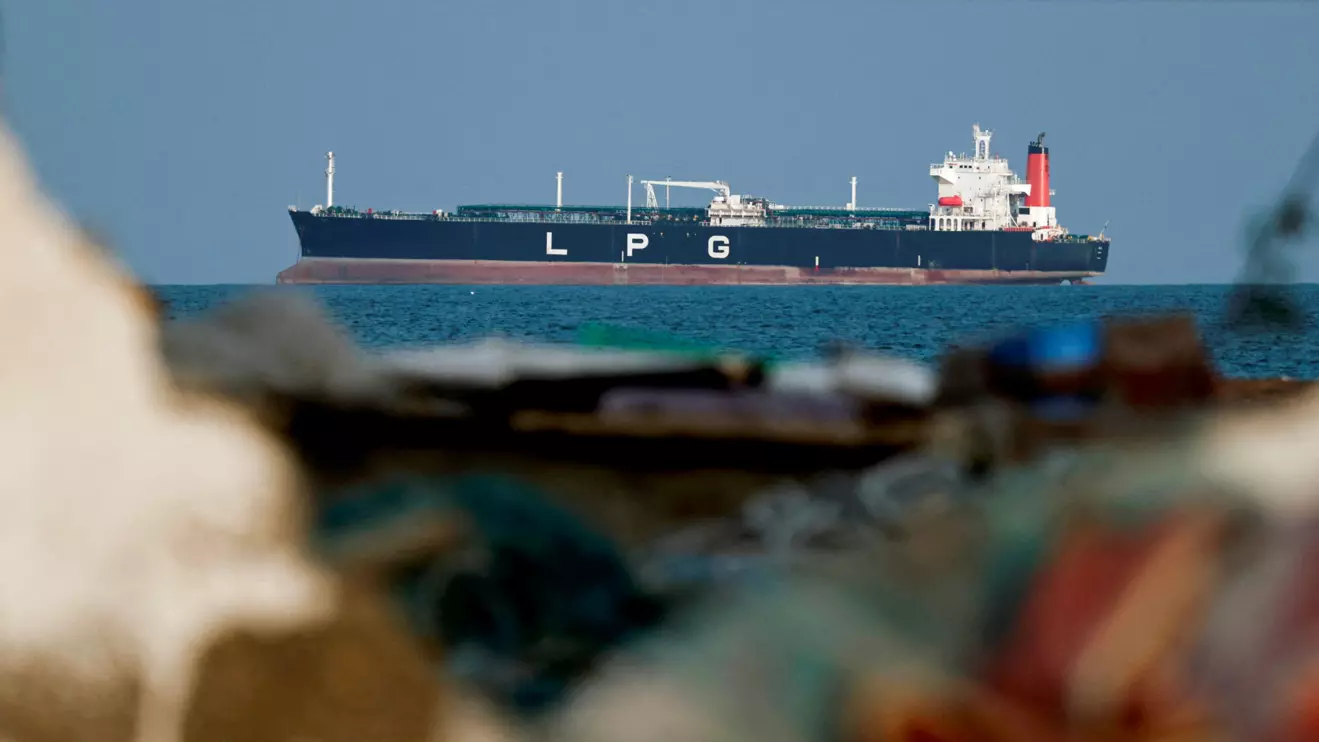 An LPG gas tanker at anchor as traffic is down in the Strait of Hormuz, amid the U.S.-Israeli conflict with Iran, in Shinas, Oman, March 11, 2026. Reuters/Benoit Tessier
