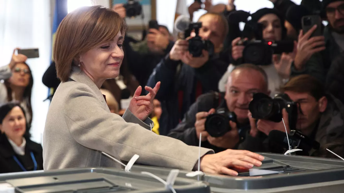 Moldova's incumbent President and presidential candidate Maia Sandu casts her ballots at a polling station, as the country holds a presidential election and a referendum on joining the European Union, in Chisinau, Moldova October 20, 2024. Reuters/Vladislav Culiomza