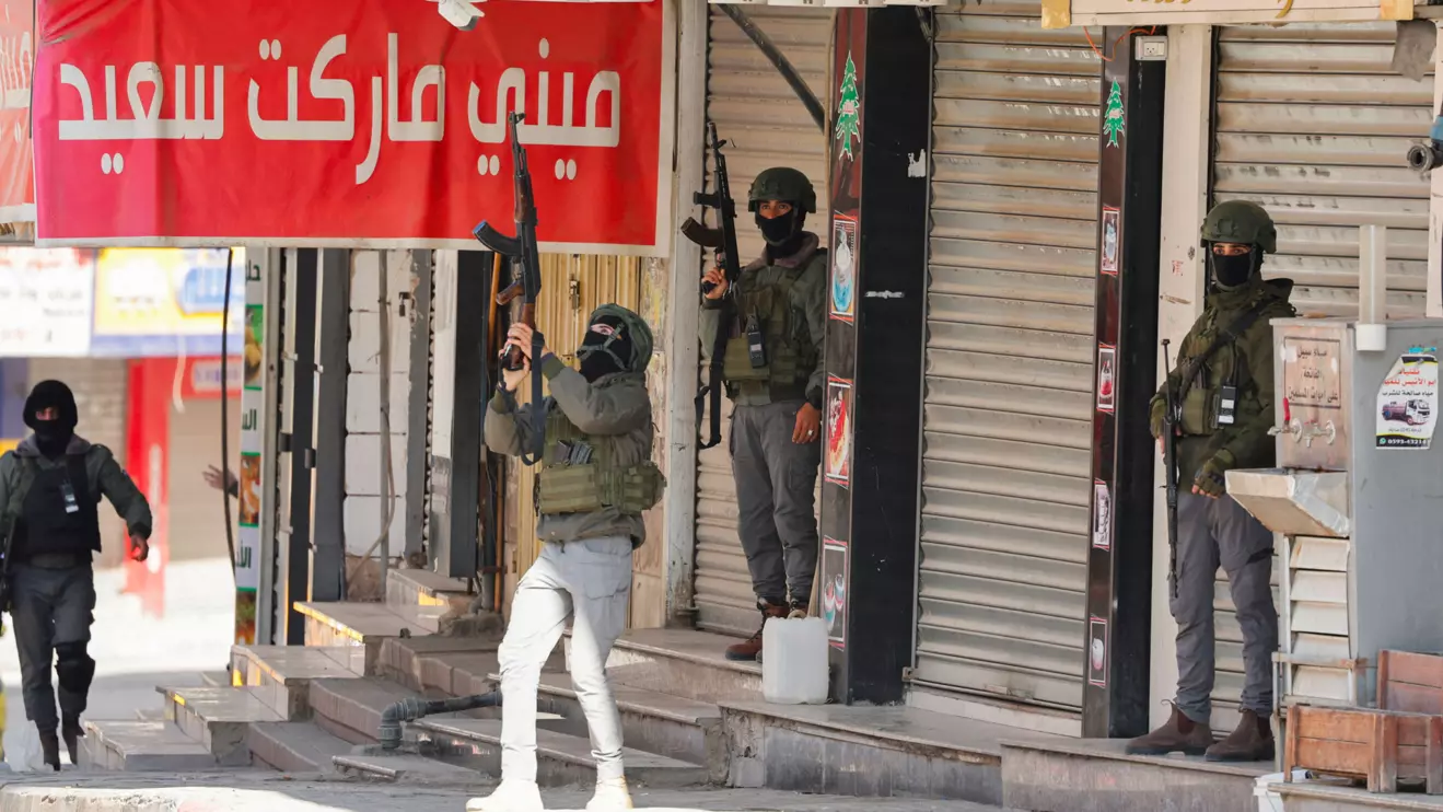 Palestinian security forces patrol amid clashes with militants at the camp, in Jenin in the Israeli-occupied West Bank, December 14, 2024. Reuters/Raneen Sawafta