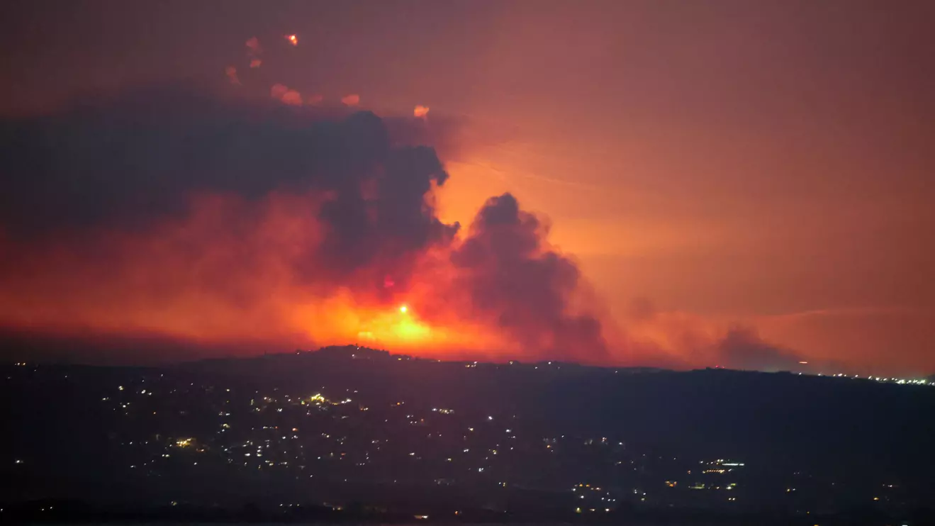 A view shows smoke and fire on the Lebanese side of the border with Israel, after Israel said it had noted armed group Hezbollah preparing to attack Israel and had carried out pre-emptive strikes on Hezbollah targets in Lebanon, as seen from Tyre, southern Lebanon August 25, 2024. Reuters/Aziz Taher