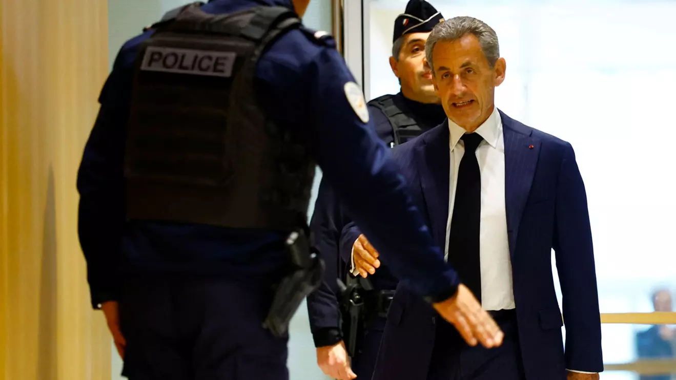 Former French President Nicolas Sarkozy arrives on the first day of his trial with twelve other defendants on charges of corruption and illegal financing of an election campaign related to alleged Libyan funding of his successful 2007 presidential bid, at the courthouse in Paris, France, January 6, 2025. Reuters/Sarah Meyssonnier