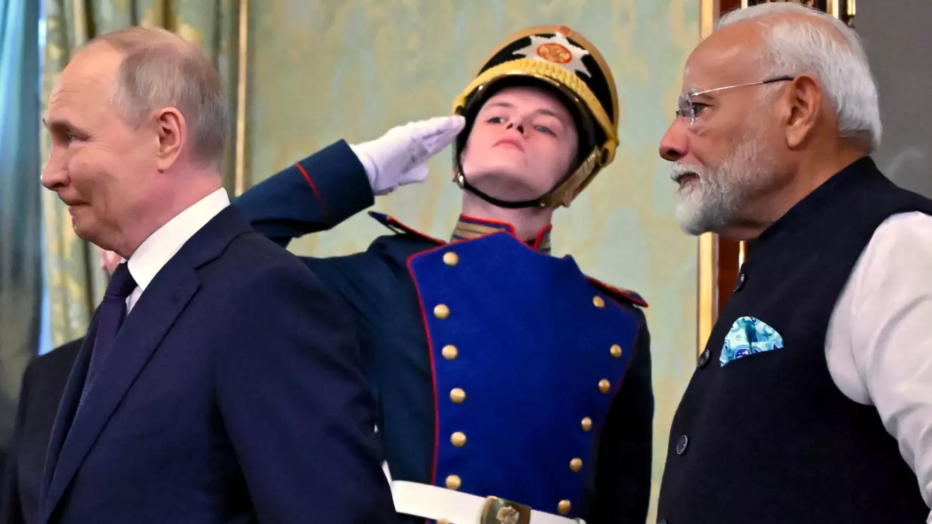 Russia's President Vladimir Putin and India's Prime Minister Narendra Modi enter a hall during a meeting at the Kremlin in Moscow, Russia July 9, 2024. Alexander Nemenov/Pool via Reuters