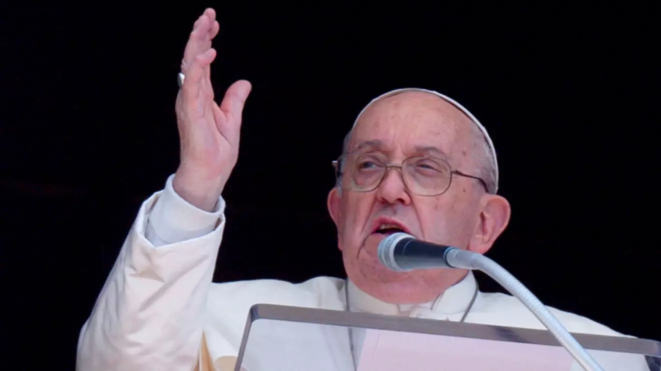 Pope Francis leads the Regina Caeli prayer from his window at the Vatican, April 14, 2024. Vatican Media/­Handout via Reuters