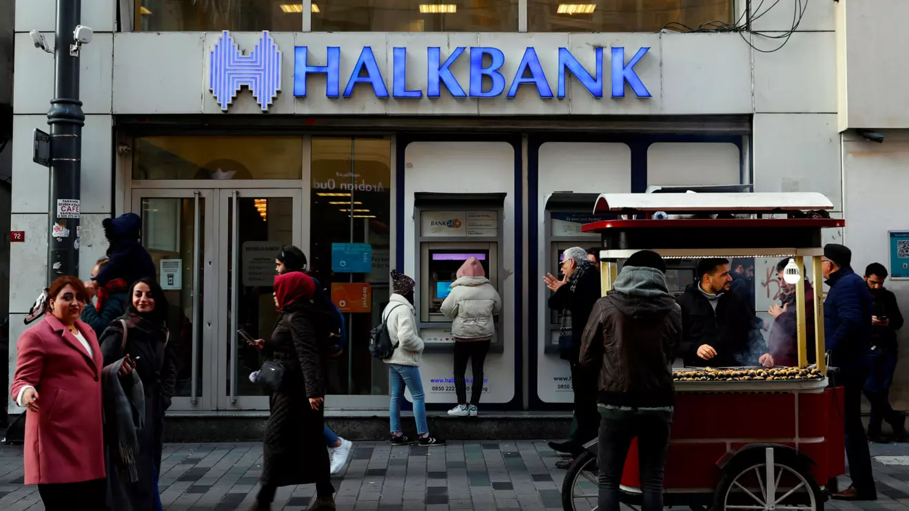People walk past a branch of Halkbank in central Istanbul, Reuters/Murad Sezer