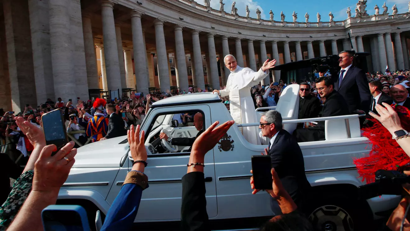 Pope Leo XIV waves to the faithful from the popemobile ahead of his inaugural Mass in Saint Peter’s Square, at the Vatican, May 18, 2025. Reuters/Alessandro Garofalo