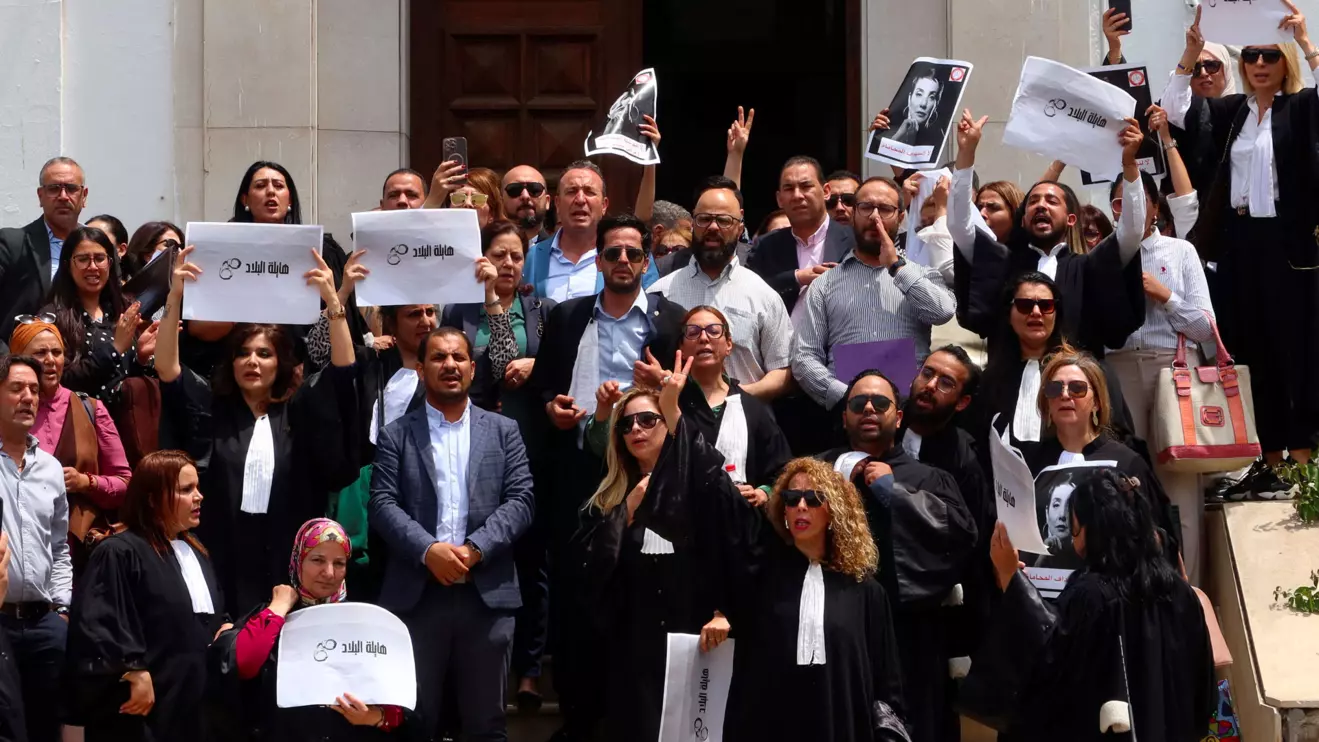 Lawyers carry banners during a protest against the arrest of Sonia Dahmani, a prominent lawyer critical of the president, outside the Palace of Justice building in Tunis, Tunisia May 13, 2024. Reuters/Jihed Abidellaoui