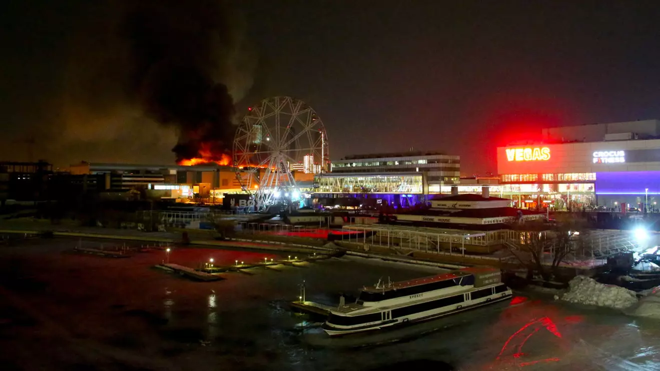Smoke rises above the burning Crocus City Hall concert venue following a reported shooting incident, outside Moscow, March 22, 2024. Sergei Vedyashkin/Moscow News Agency/Handout via Reuters