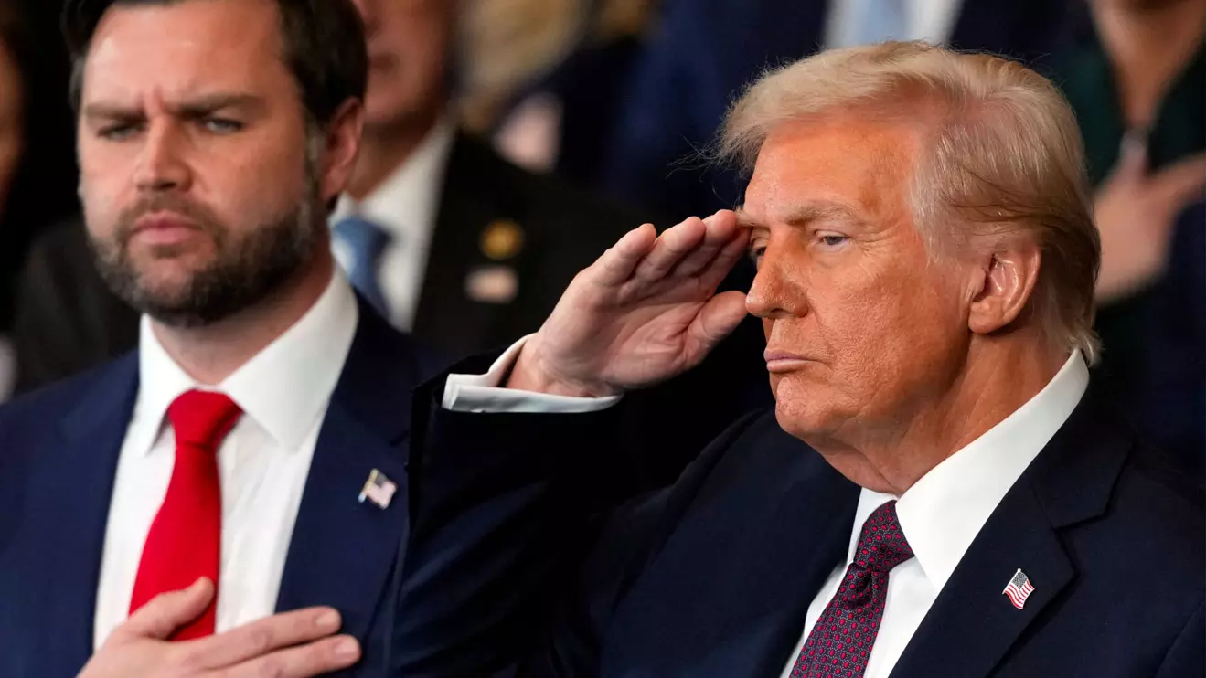 President Donald Trump and Vice President JD Vance listen to Christopher Macchio sing during the 60th Presidential Inauguration in the Rotunda of the U.S. Capitol in Washington, Monday, Jan. 20, 2025. Julia Demaree Nikhinson/Reuters