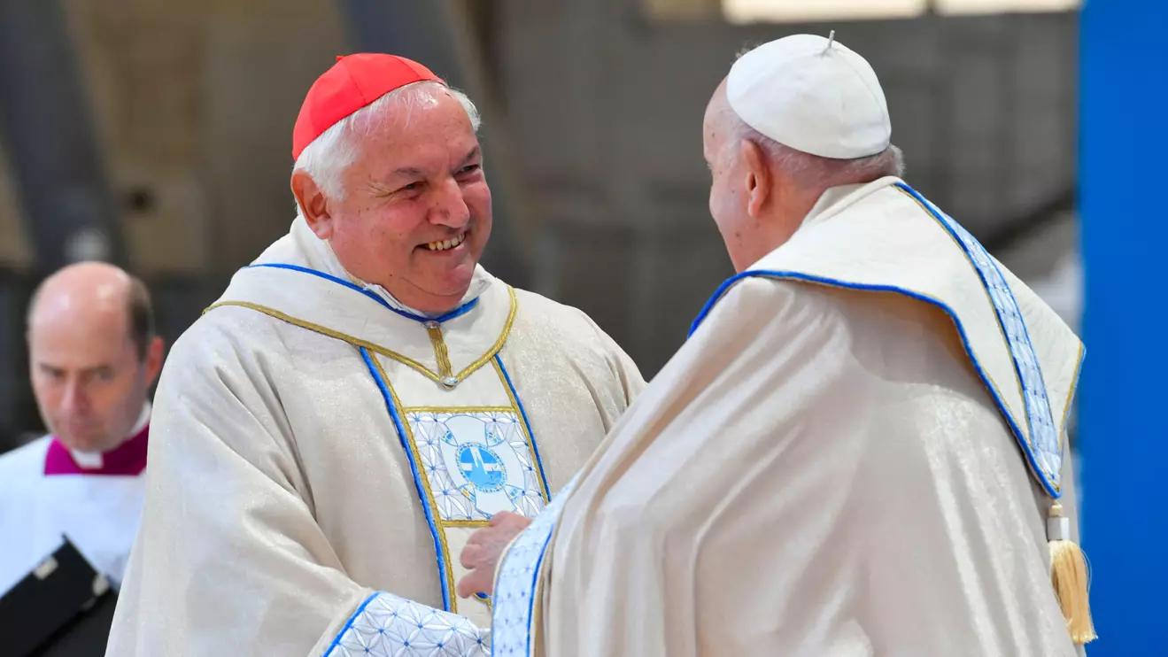Pope Francis speaks to Marseille's archbishop Cardinal Jean-Marc Aveline, at a mass at the Velodrome Stadium, as a part of his journey on the occasion of the Mediterranean Meetings (MED 2023) in Marseille, France, September 23, 2023. Vatican Media