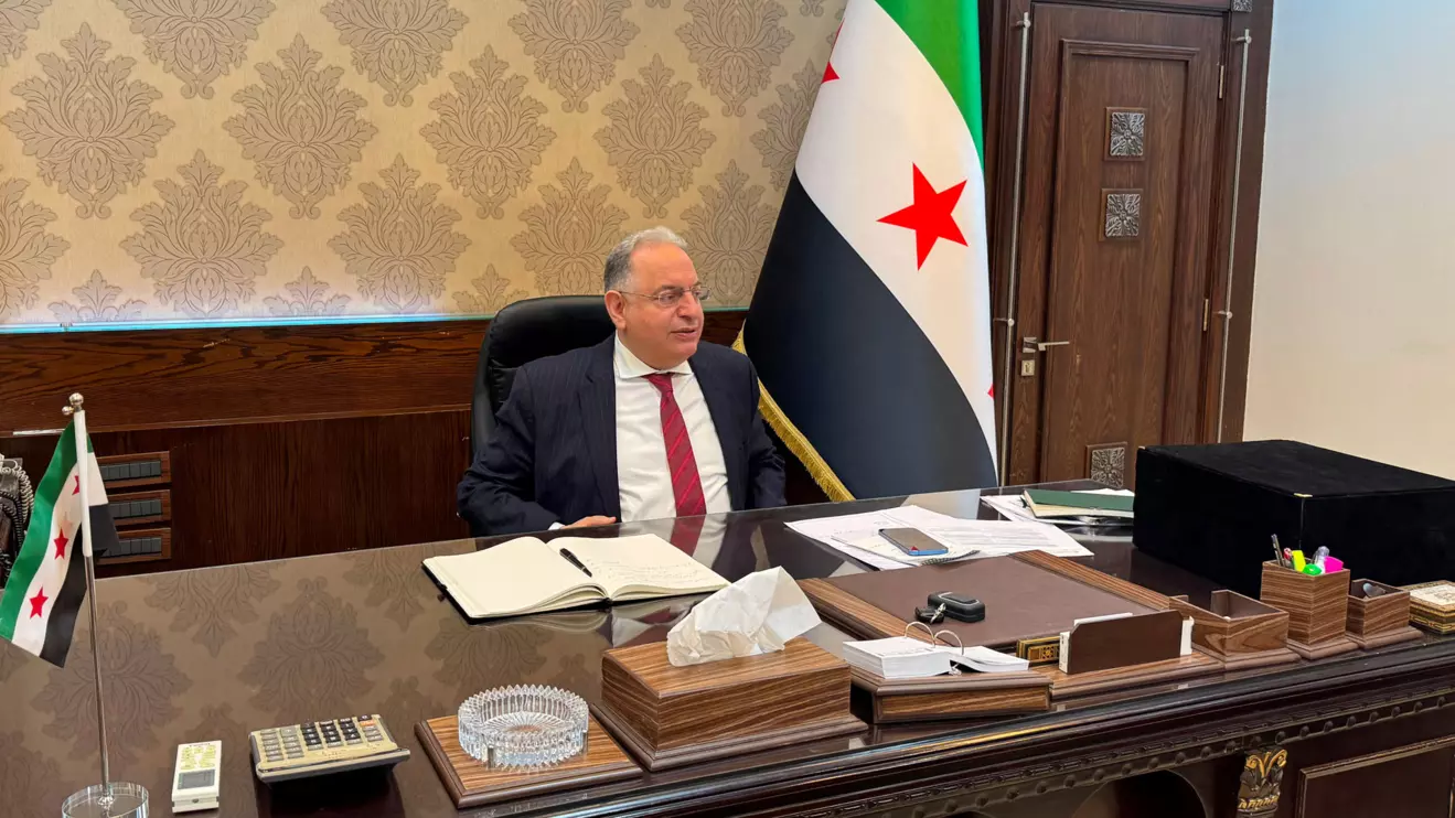 Syrian Finance Minister Yisr Barnieh attends an interview with Reuters at his office at the finance ministry in Damascus, May 14, 2025. Reuters/Timour Azhari