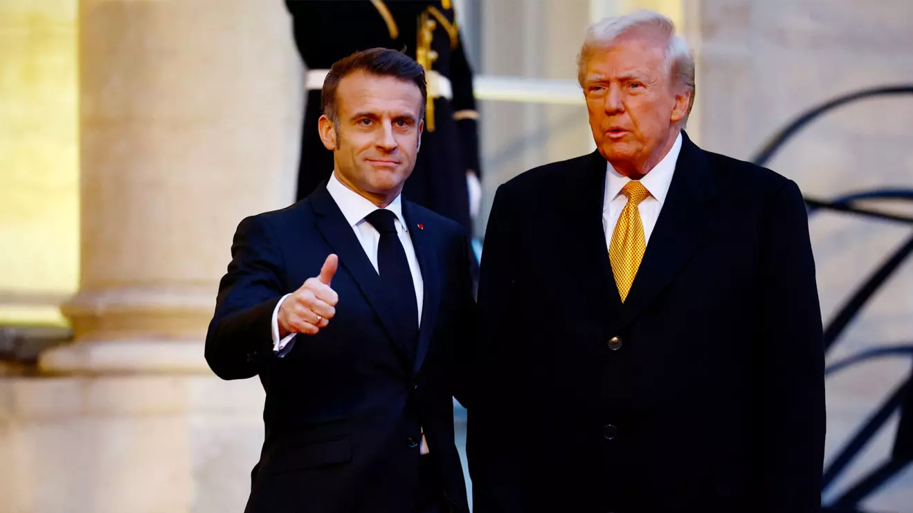 French President Emmanuel Macron welcomes U.S. President-elect Donald Trump as he arrives for a meeting at the Elysee Palace in Paris, Reuters/Sarah Meyssonnier