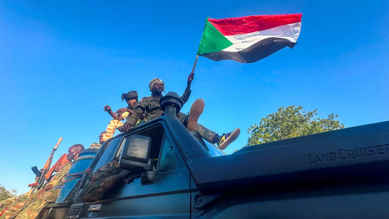 Sudan's army soldiers celebrate after entering Wad Madani, in Sudan, January 12, 2025. Reuters/El Tayeb Siddig