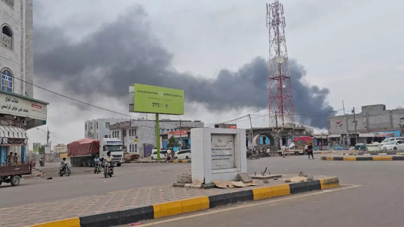 Smoke rises from the port following what the Yemeni military say was a Houthi attack on Mocha, Yemen, August 9, 2026 in this still image taken from video. Video obtained by Reuters