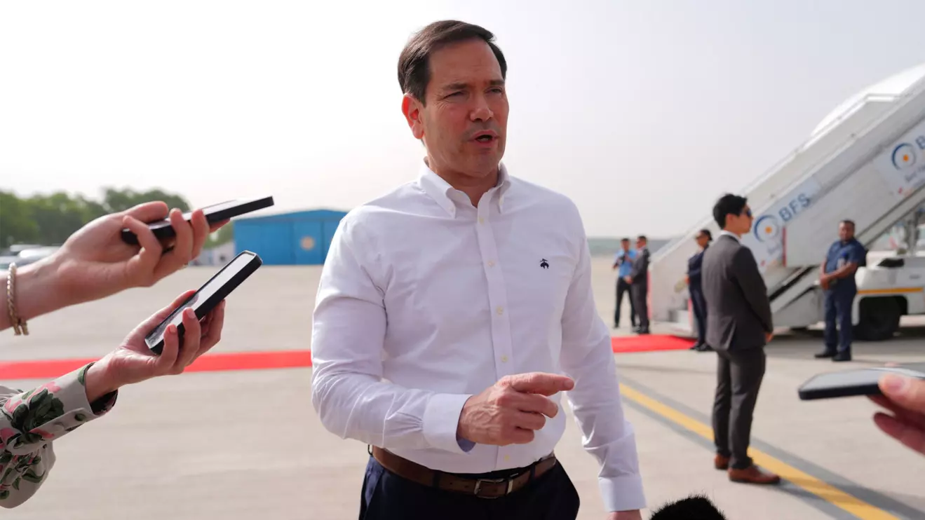 United States Secretary of State Marco Rubio speaks to the journalists before boarding his plane at Indira Gandhi International Airport in New Delhi, India, Monday, May 25, 2026. Julia Demaree Nikhinson/Reuters