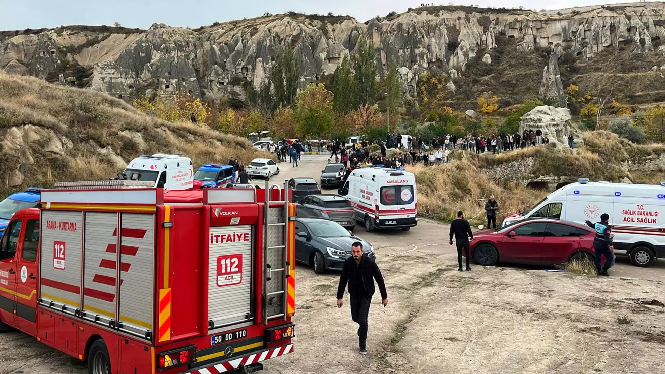 A fire truck and ambulances are parked near the scene after rocks fell from a fairy chimney, a volcanic rock formation, following heavy rainfall in Goreme, in central Cappadocia region, Turkey, October 29, 2026. Ihlas News Agency via Reuters